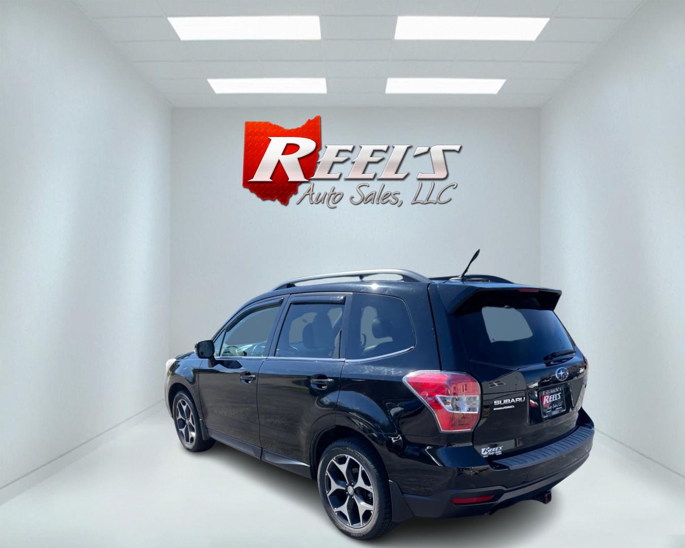 2014 Black /Black Subaru Forester 2.0XT Touring (JF2SJGMC4EH) with an 2.0L H4 SOHC 16V TURBO engine, Automatic transmission, located at 547 E. Main St., Orwell, OH, 44076, (440) 437-5893, 41.535435, -80.847855 - Photo#7